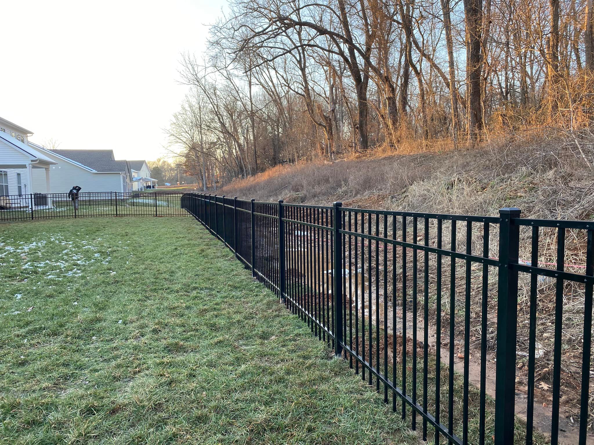 Premium aluminum fence installation featuring a classic flat-top design.