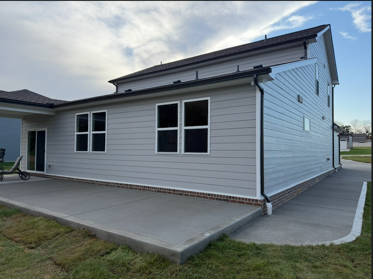 Custom stamped concrete patio poured for enhanced outdoor entertaining in Clarksville.